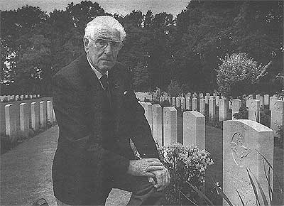 Mr. Gieling at the grave of Lt. Watling who's remains were identified after 50 years.